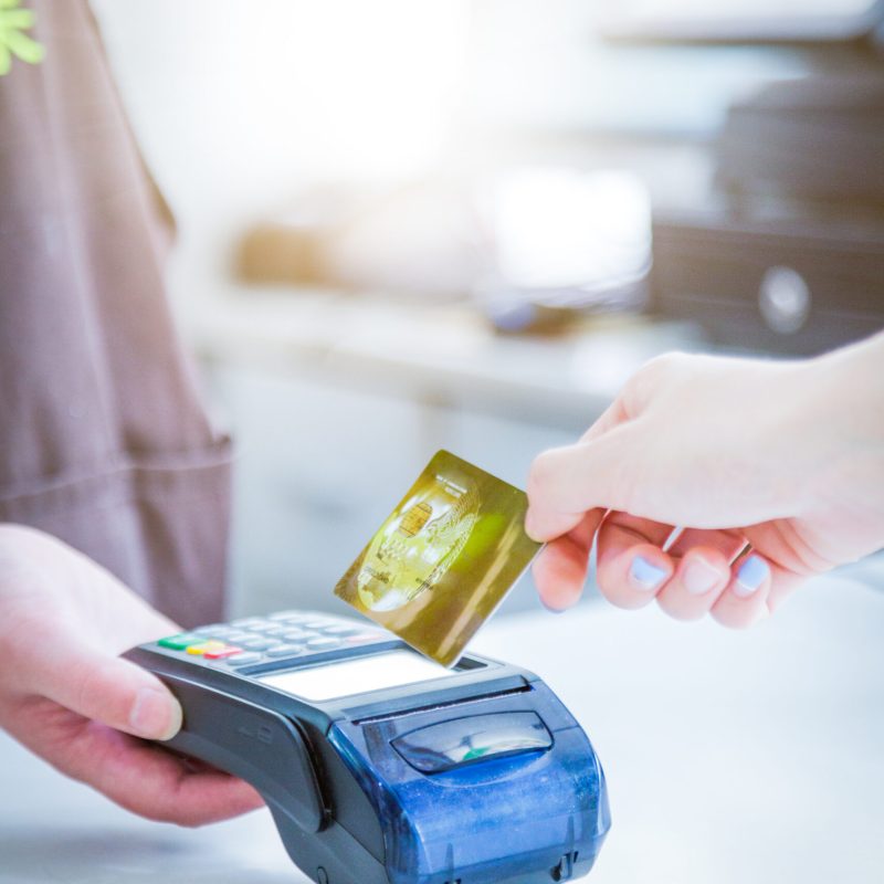Card payment with chip and pin machine in shop
