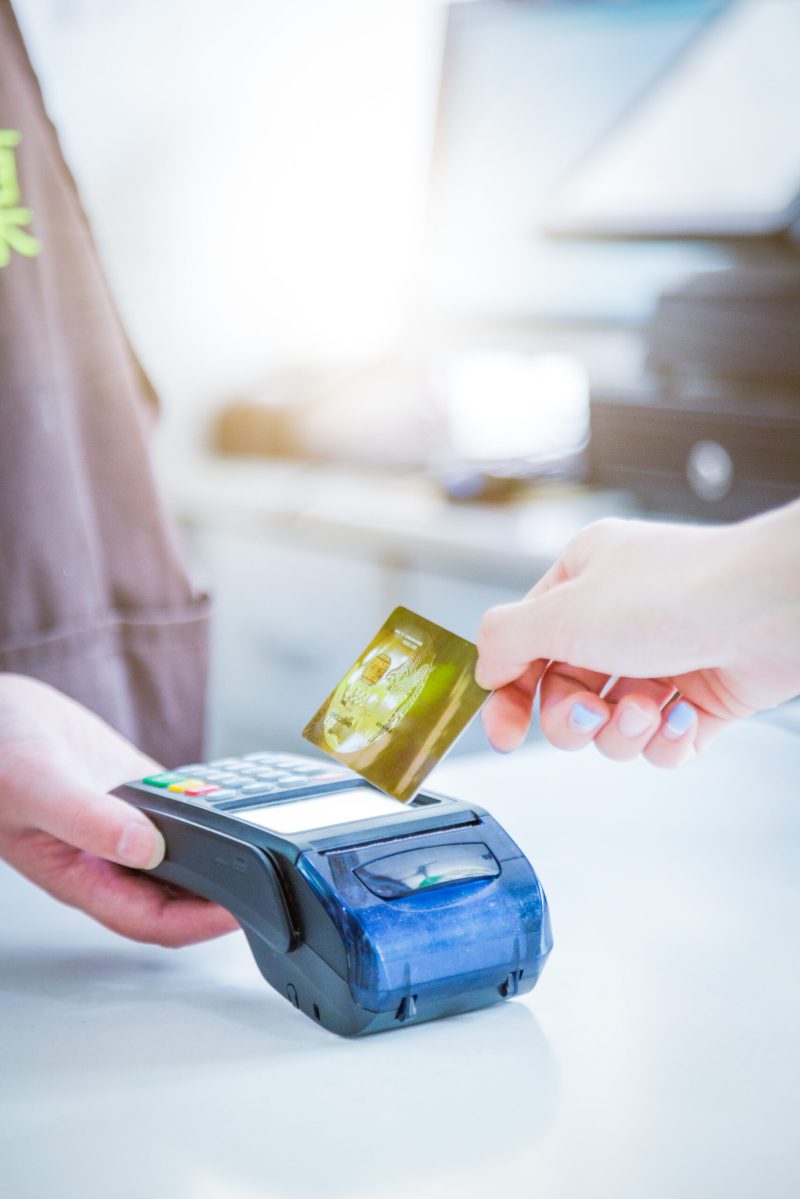 Card payment with chip and pin machine in shop